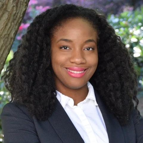 Headshot for sloopdoctor.shop contributing writer, Afy Okoye